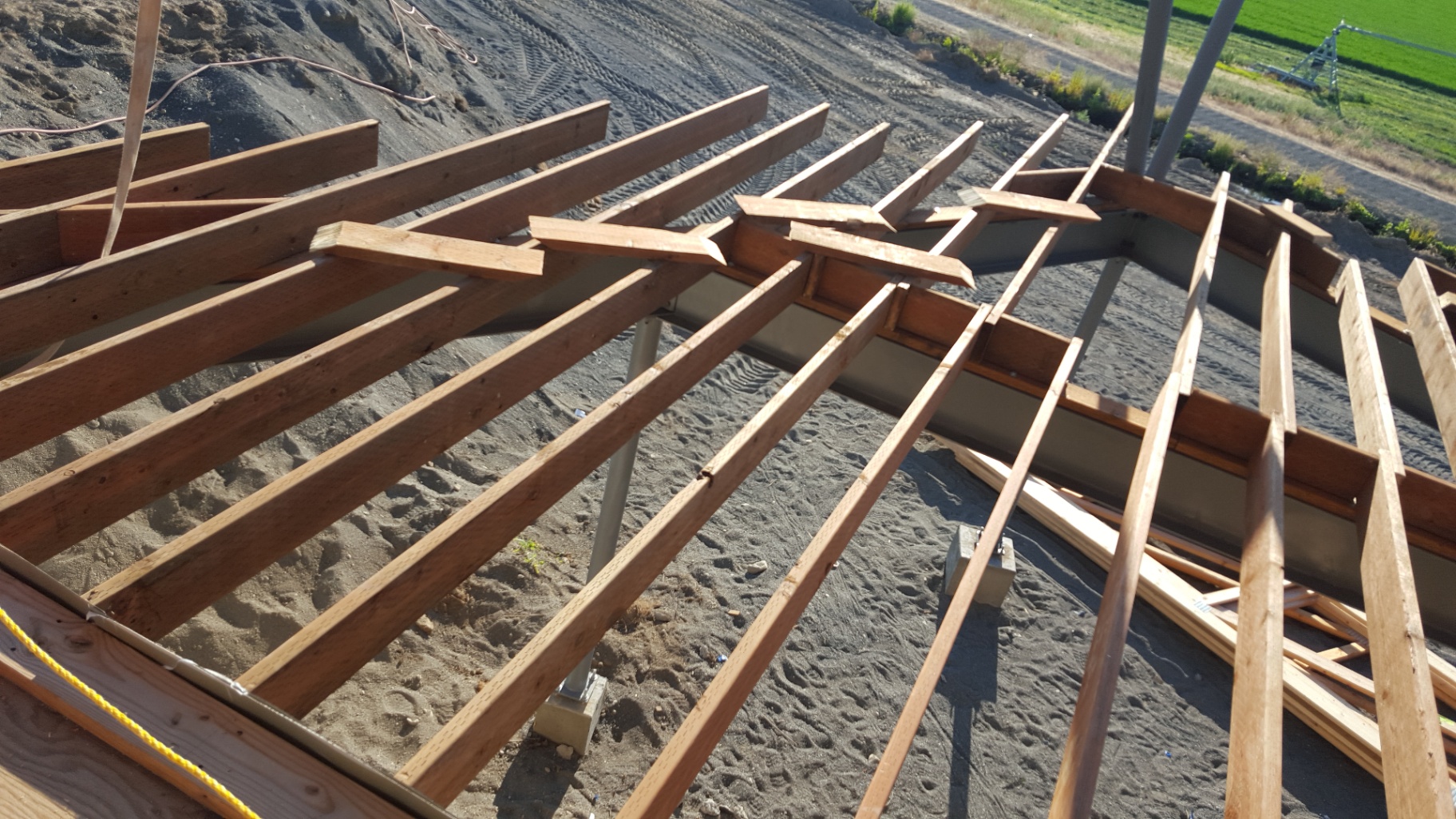 Floor joists laid out on stem walls and pier blocks